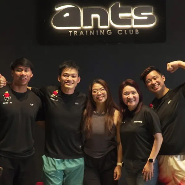 The five ANTS Training Club coaches together under the club sign